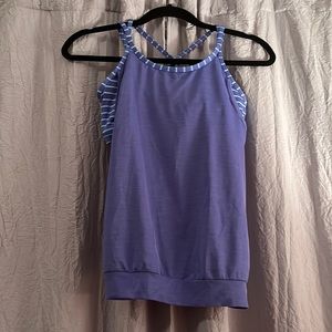 Purple athletic tank with built in sports bra.